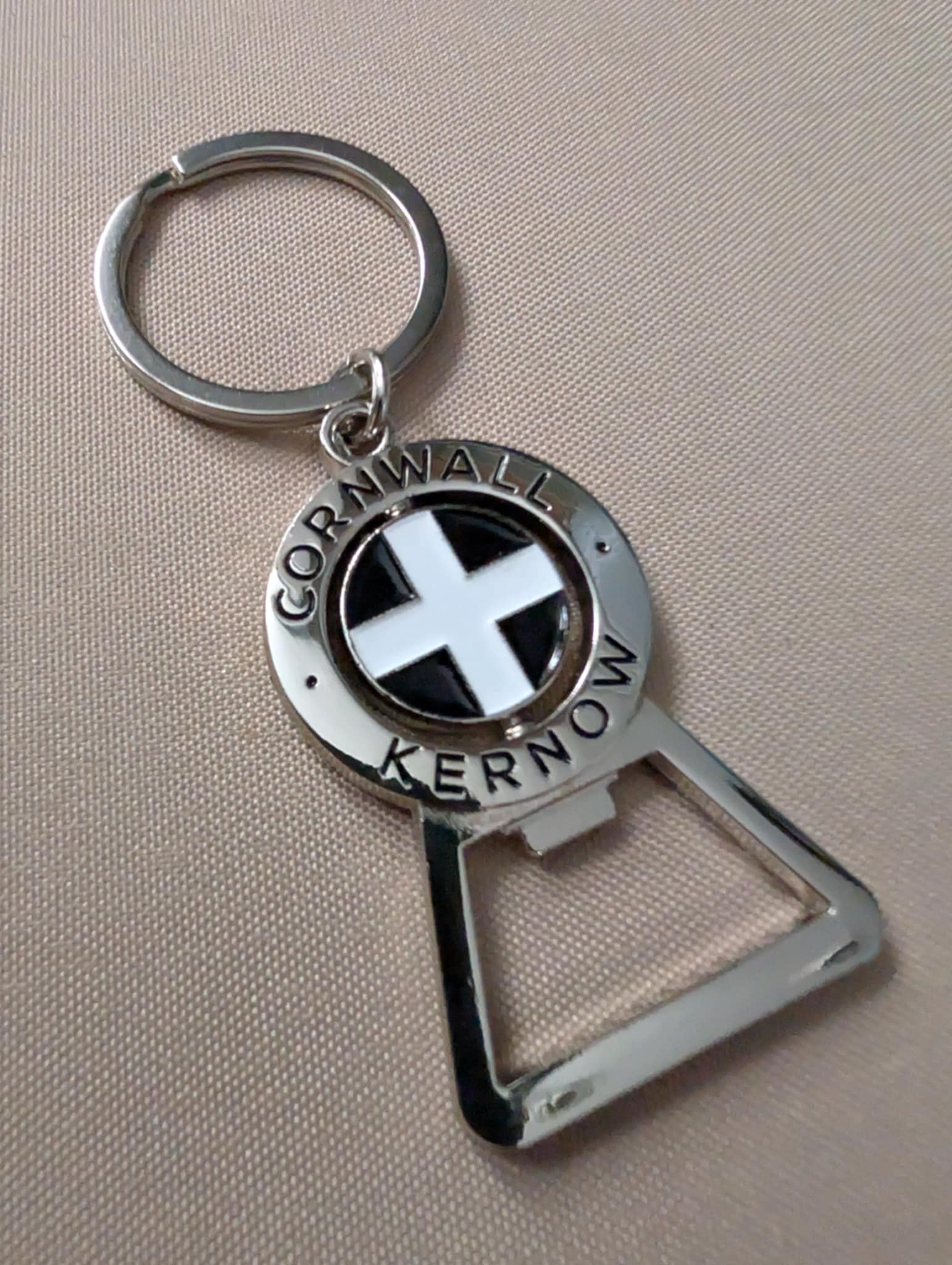 Cornwall Spinning Logo Bottle Opener Keyring